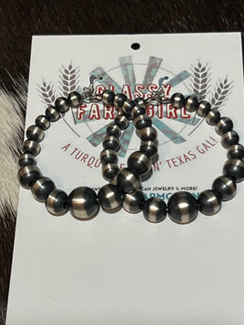 Theresa Belone Graduated Pearl Hoop Earrings