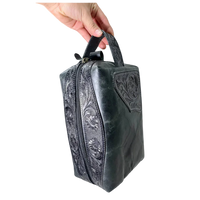 
              Black Tooled Leather Toiletry Bag
            