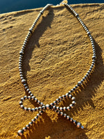 
              Bow Bead Necklace
            