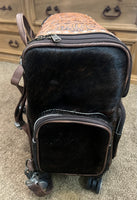 
              Tooled Leather & Cowhide Rolling Suitcase Backpack
            
