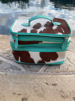 
              Cowhide & Turquoise Make Up Bag
            