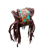 
              Turquoise & Tooled Leather Fringe Bracelet
            