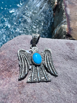 Henry Yazzie Thunderbird Sleeping Beauty Tufa Pendant