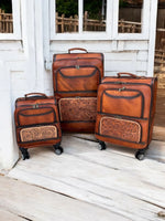 
              Burn Tooled Leather Rolling Suitcase
            