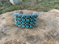 
              Darlene Begay Kingman Turquoise SS Cluster Cuff
            