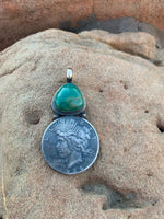 
              Steven Nez Liberty Coin Kingman Turquoise Pendant
            