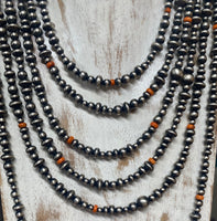
              Orange Spiny Graduated Pearl & Saucer Bead SS Necklace
            